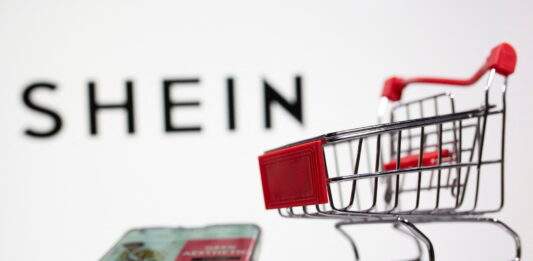 File Photo: A Keyboard And A Shopping Cart Are Seen In Front Of A Displayed Shein Logo In This Illustration Picture