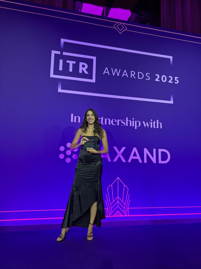 Maria panayiotou receiving the award