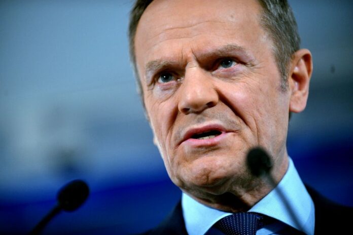 Donald tusk holds press conference in warsaw