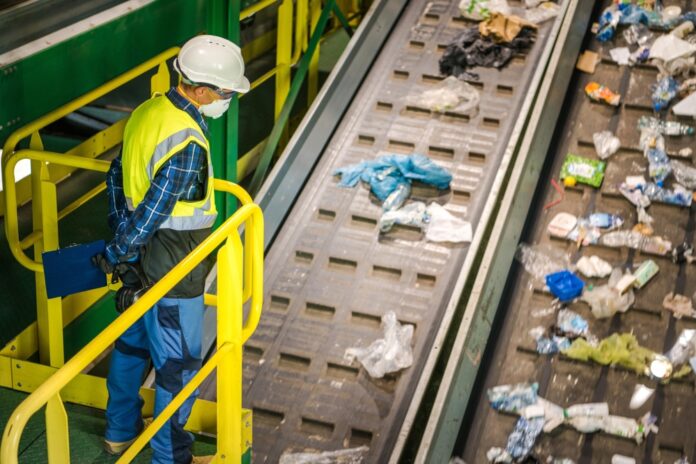 Waste,Sorting,Facility,Management,Control.,Trash,Conveyors,Operator,Performing,Daily
