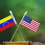 United,States,Of,America,And,Venezuela,Small,Flag,With,Blur