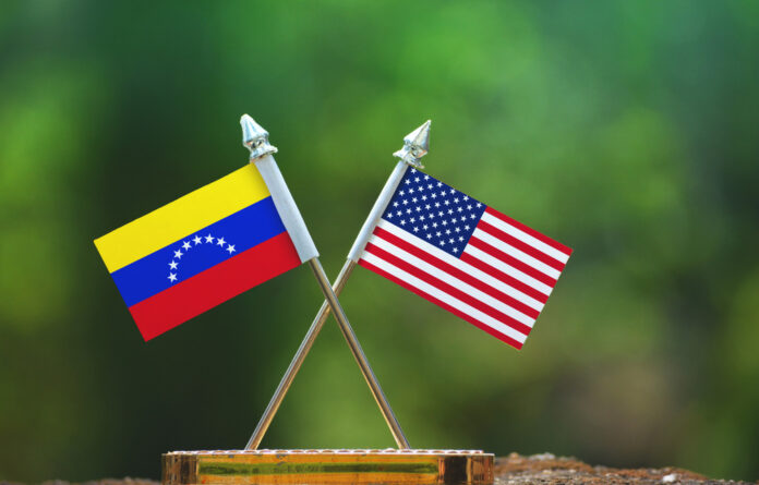 United,States,Of,America,And,Venezuela,Small,Flag,With,Blur