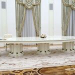 Macron putin 696x441